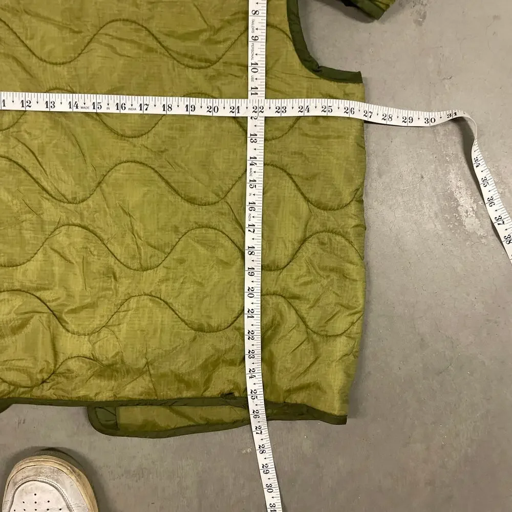 vintage men’s 90s green textured military liner quilted jacket